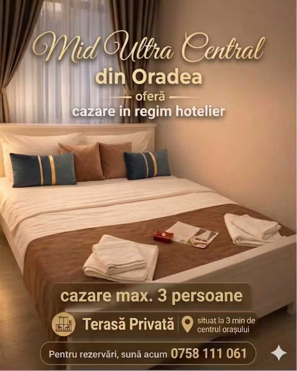 Una camera d'albergo con letto e finestra — monolocale a Oradea